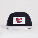 i don't care logolu beyaz-lacivert hip hop sapka